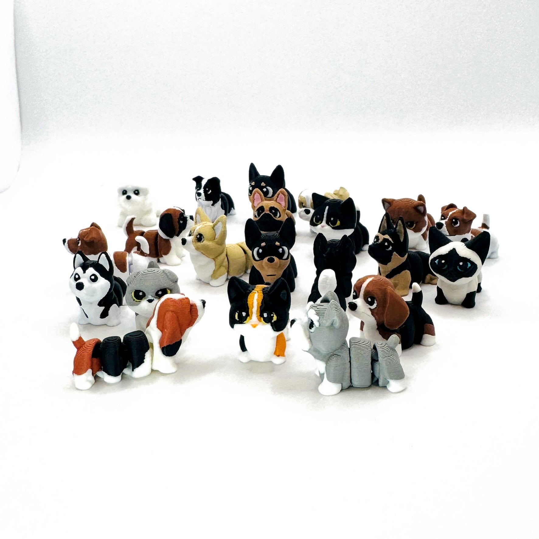The full Bubzo Paws Series, seventeen poseable dog and cat figures